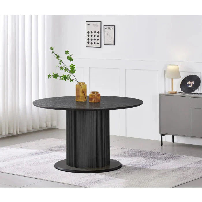 Table à manger ronde avec finition mate, piétement en métal doré et base en bois noirci - Meublei